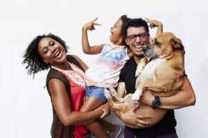 Couple with child and a dog