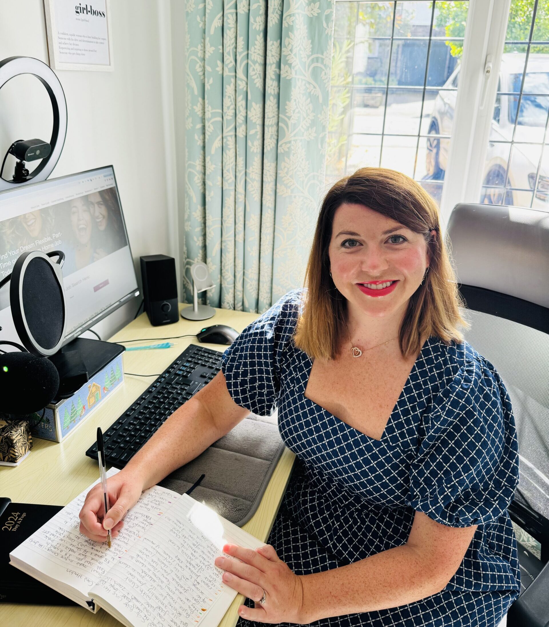 Elizabeth Willetts with a notepad